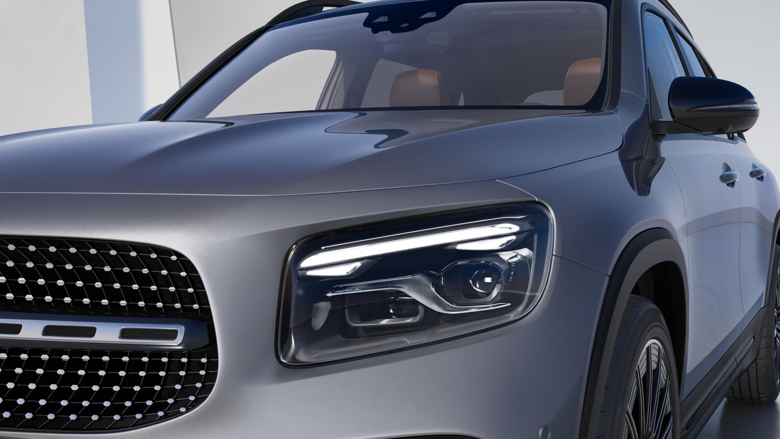 Frontansicht des Mercedes-Benz GLB mit Detailansicht der LED-Scheinwerfer und des Kühlergrills.